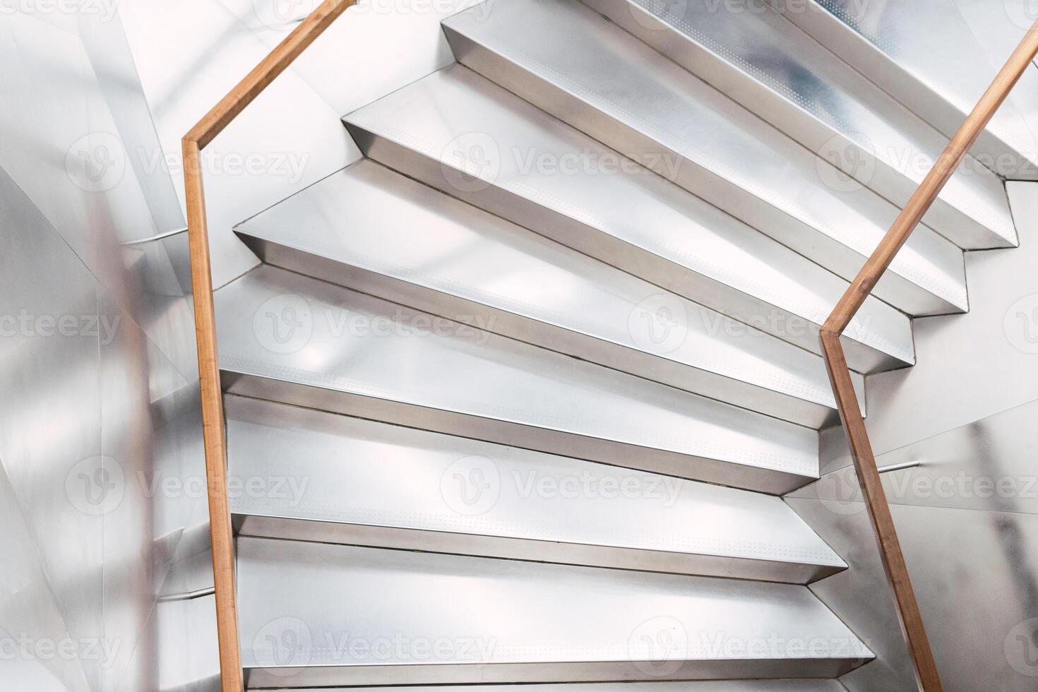 Staircase with railings in corridor photo