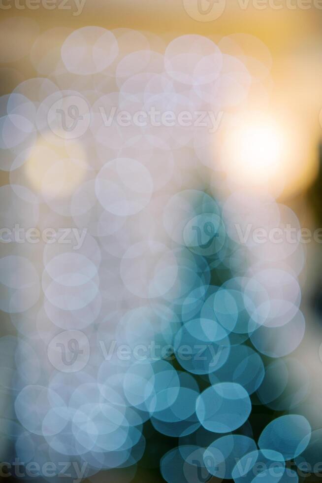 Glittering green Christmas tree. Blur photo
