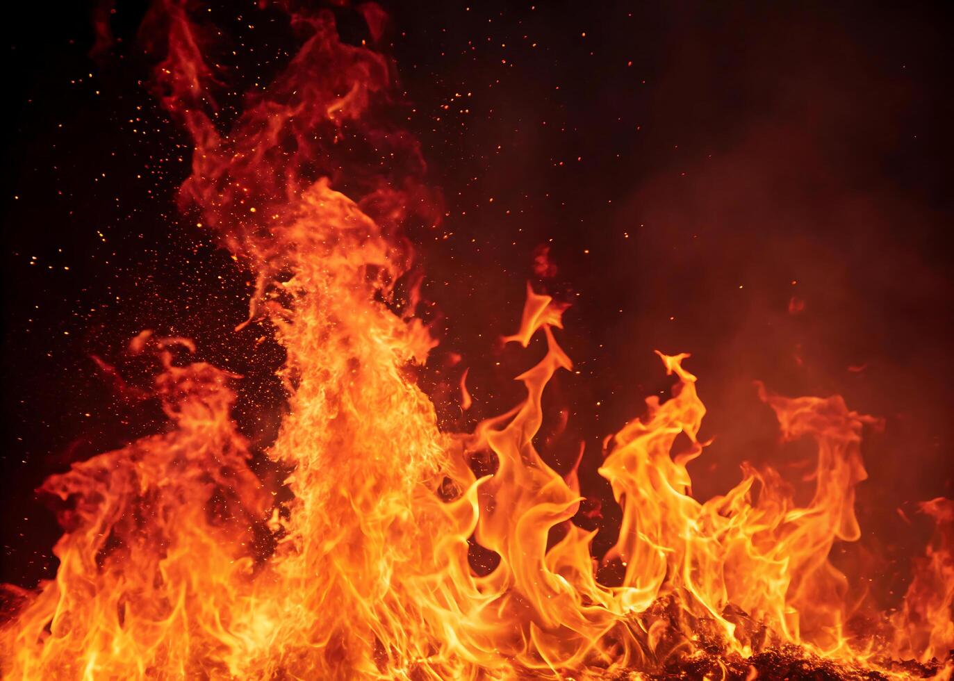 The fire is burning, the background creates an energetic and dramatic effect. photo
