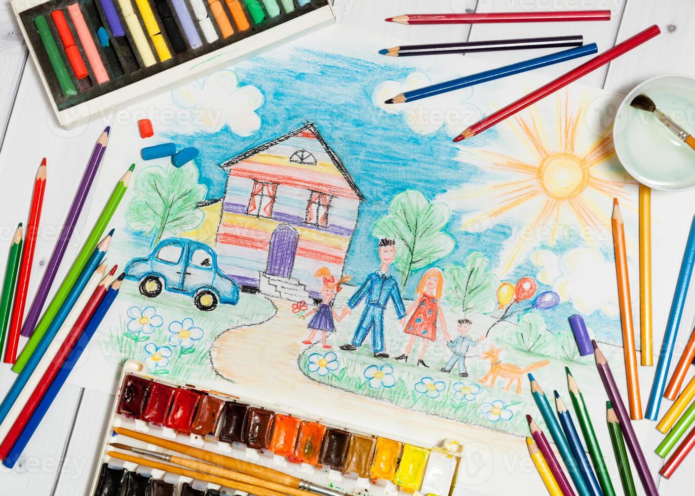 Childrens Creation With Sketch of Family,Paints And Pencils photo