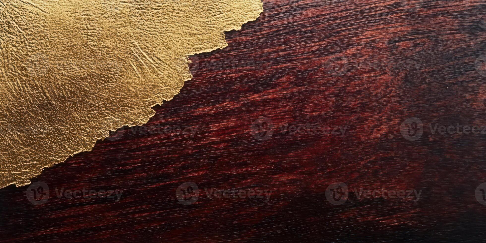 Gold and burgundy textured abstract background with metallic highlight photo