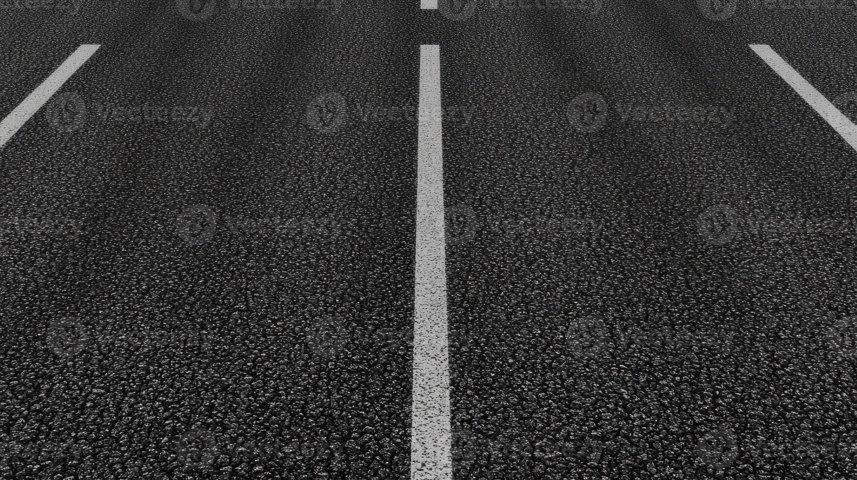 Asphalt road texture with white dividing lines captured from top view photo