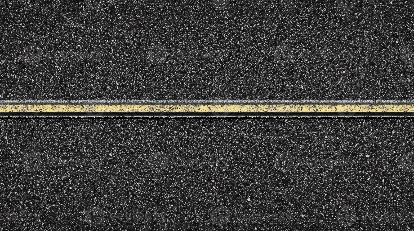 Top view of asphalt road with single yellow line for transportation concept photo