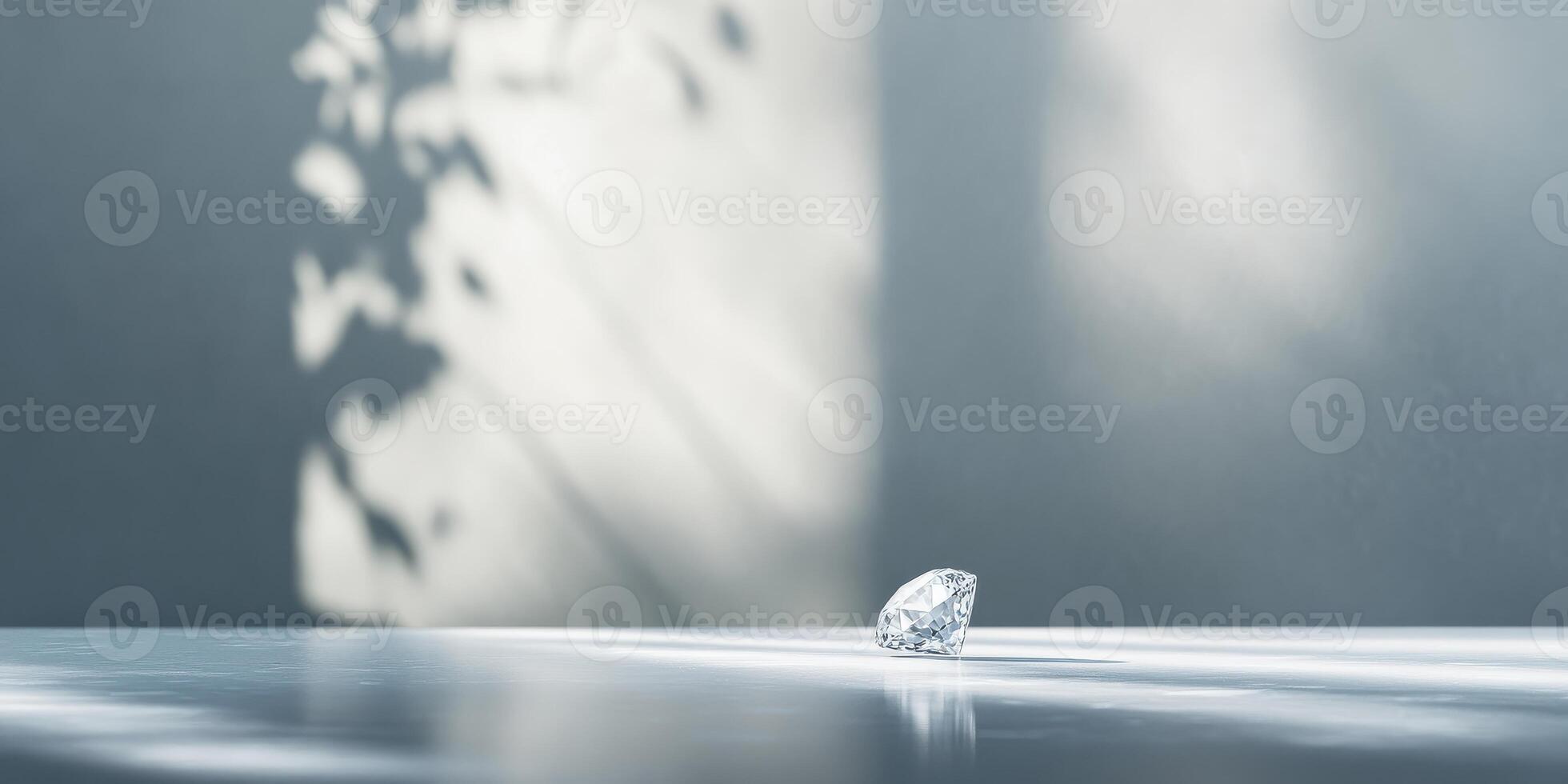Sparkling diamond on reflective surface with leaf shadows and sunlight photo