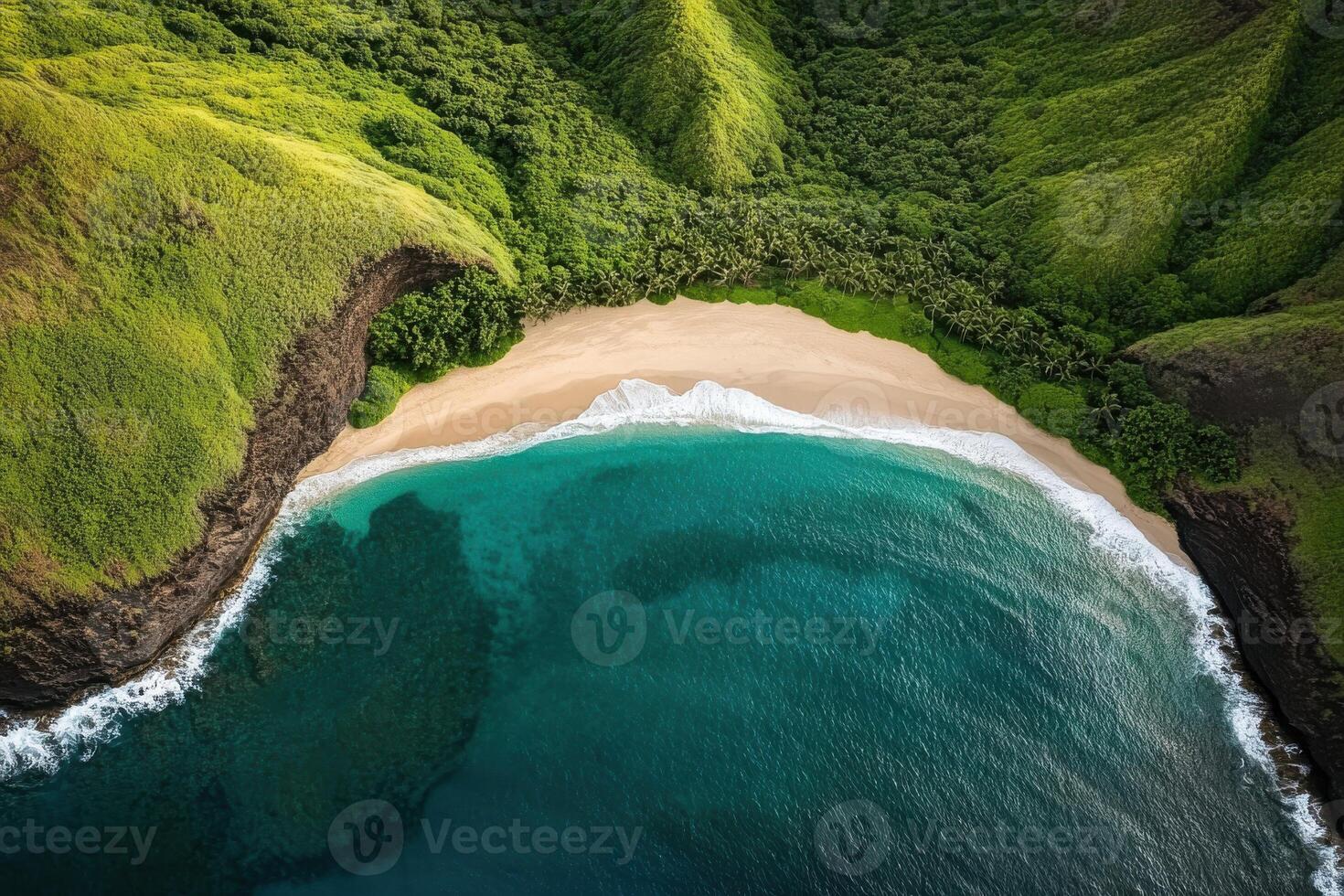 Aerial view of pristine secluded beach with lush green cliffs and turquoise ocean waters photo