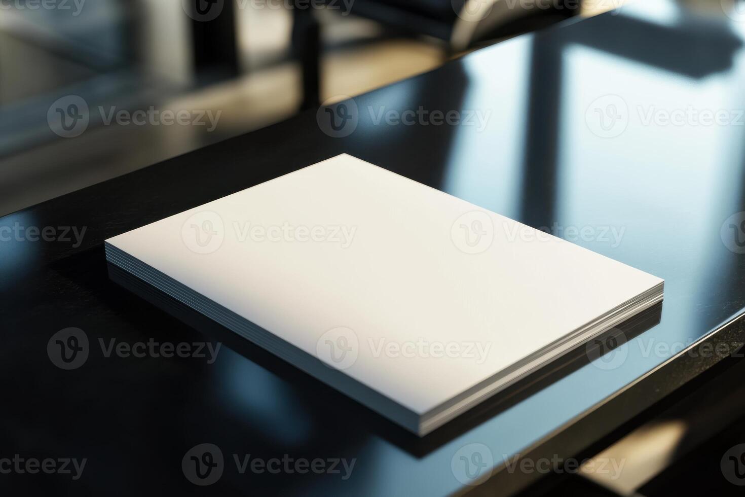 Stack of blank white a4 paper sheets on a dark modern desk in office setting photo