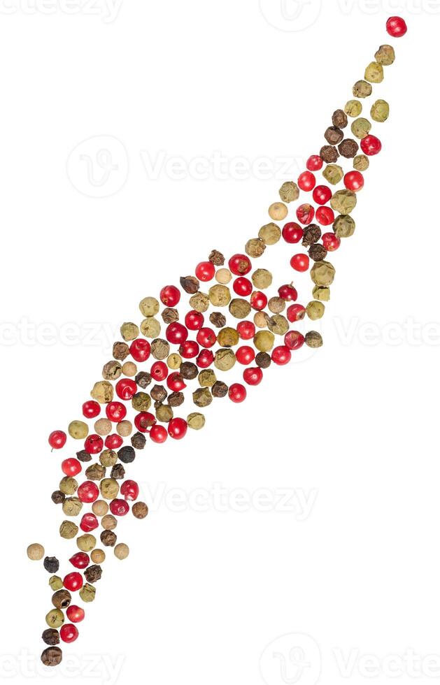 Collection of pink peppercorns arranged in a curved pattern on isolated background. Aromatic berries have a mild photo