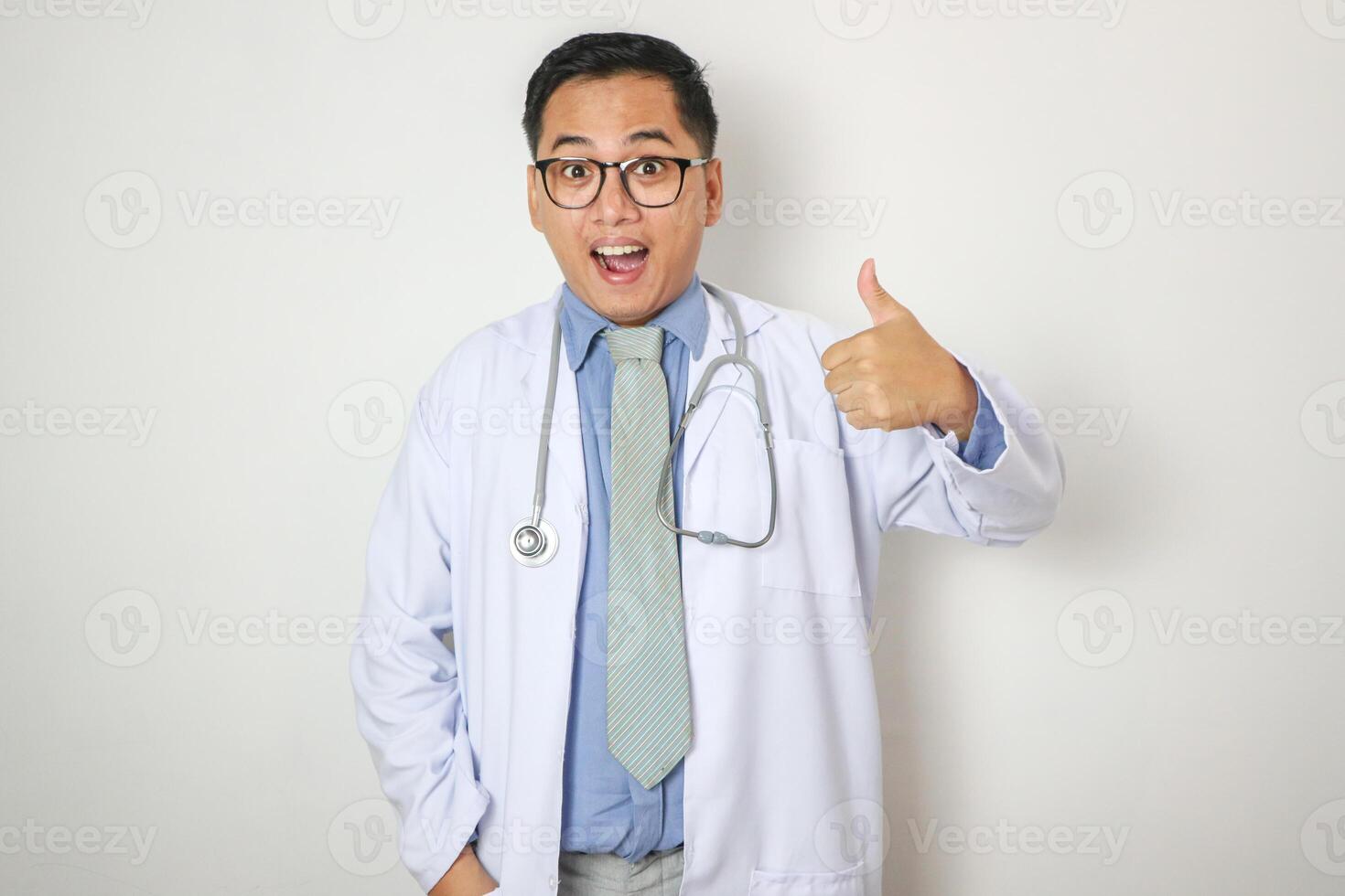 Young asian men doctor with finger thumb up photo