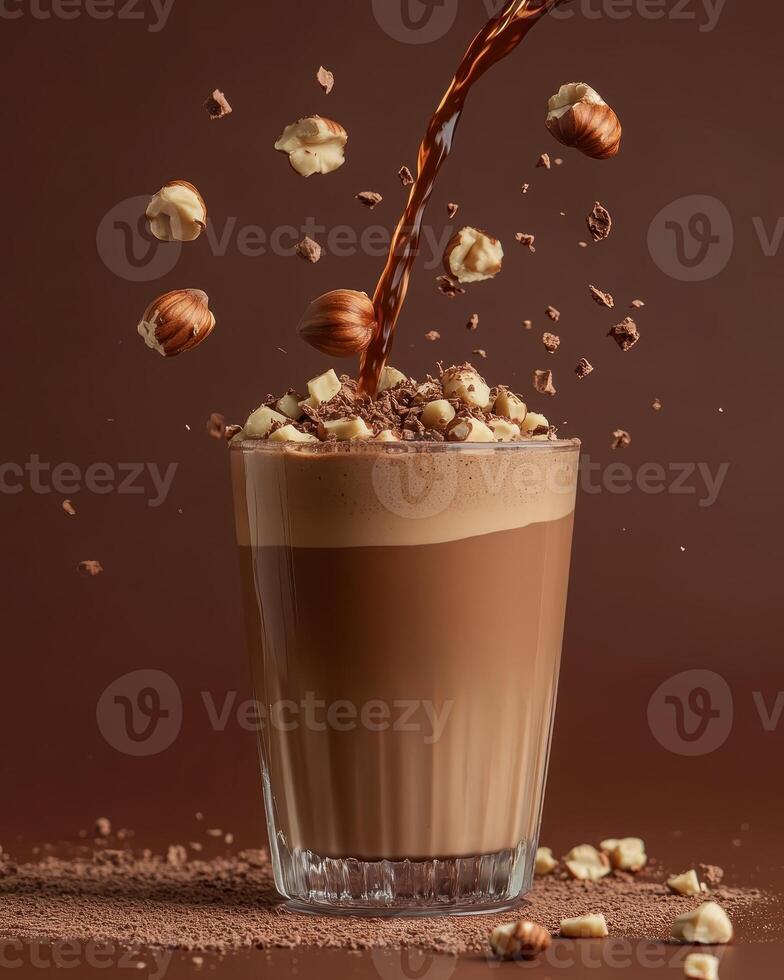 A delicious chocolate drink topped with popcorn and hazelnuts, capturing a playful, indulgent moment. photo