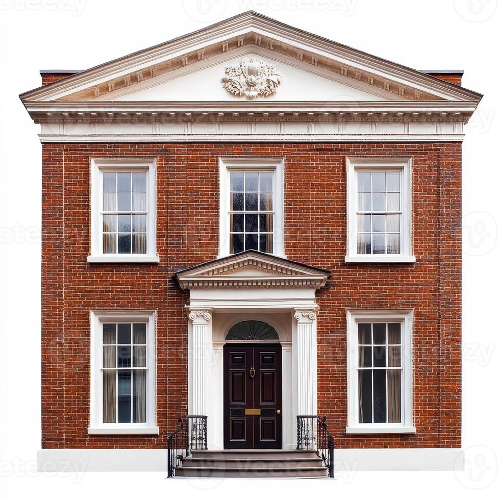 A classic brick building featuring a symmetrical facade with white accents and a central entrance. photo