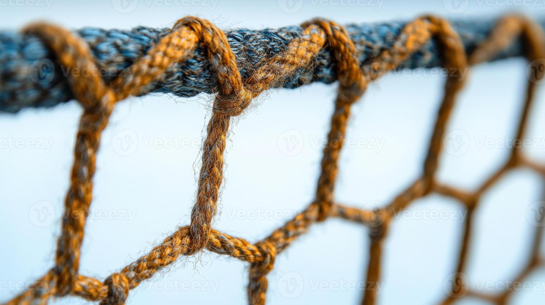 Close-Up of a Woven Rope Net with Blurred Background photo
