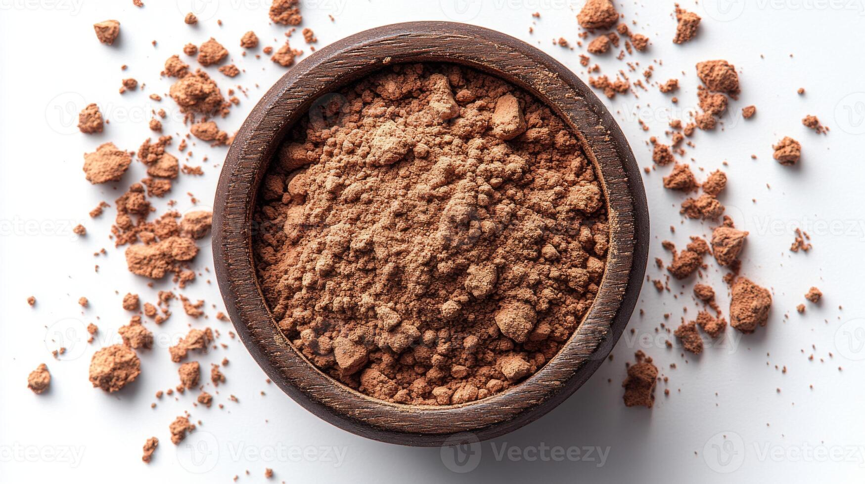 Cocoa Powder in a Wooden Bowl on a White Background photo