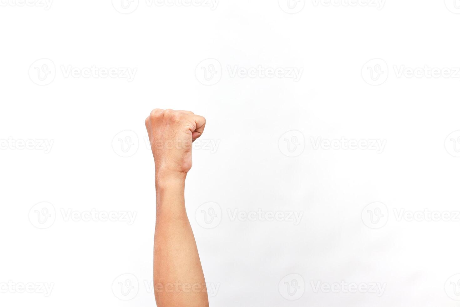 Raised Fist Symbolizing Determination and Solidarity on White Backdrop photo