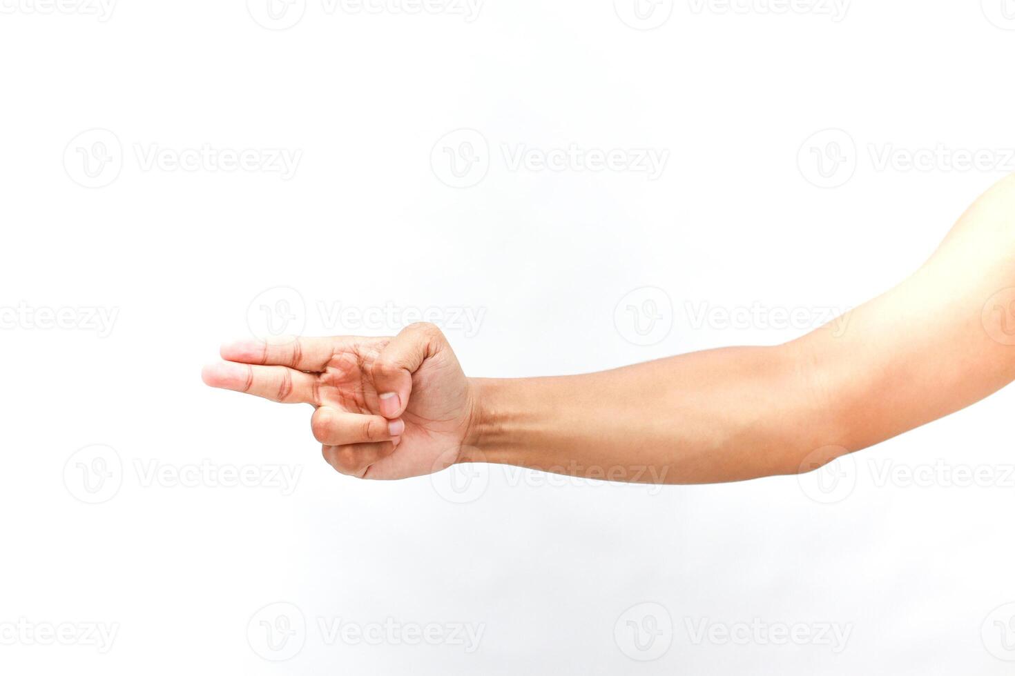 Arm and hand making a pointing gesture on an isolated white background photo