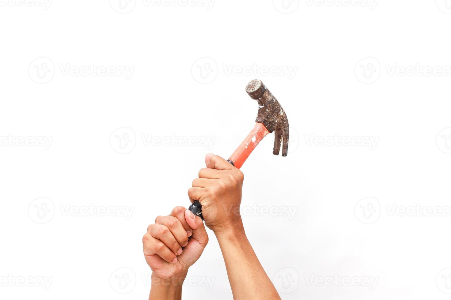 Hammer being held tightly by a man, isolated on a white background photo