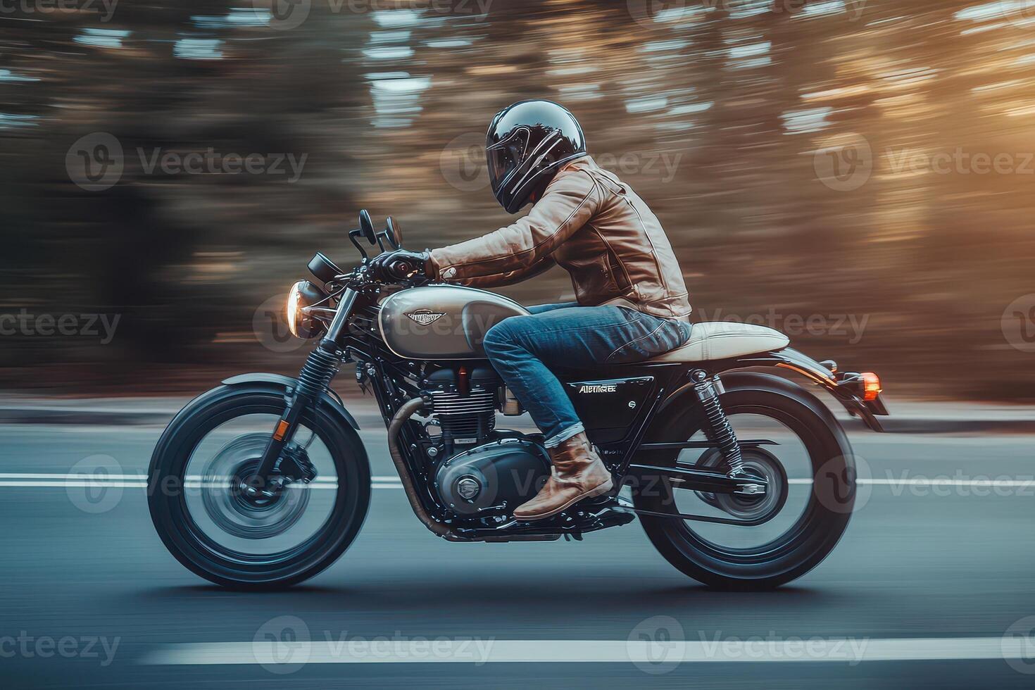 A man riding a motorcycle on a road photo
