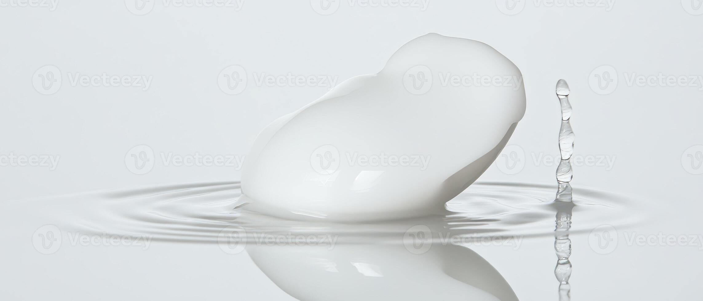 A white egg is floating in water photo