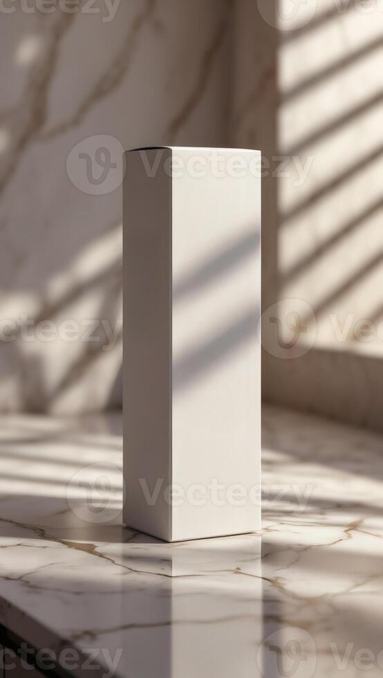 Elevated Packaging. A simple, elegant box stands against a backdrop of marble and light, conveying sophistication and quality. Timeless design. photo