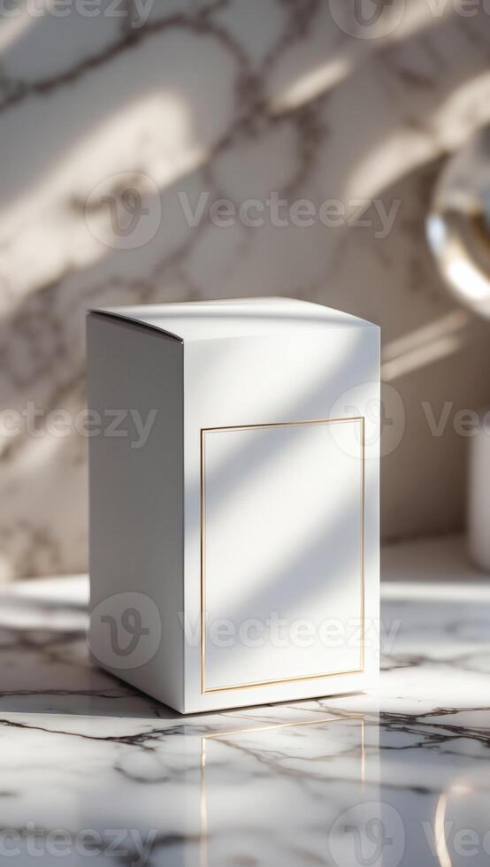 An elegant white box with gold trim stands on a marble surface, bathed in soft light. Packaging concept conveying simplicity and luxury. photo