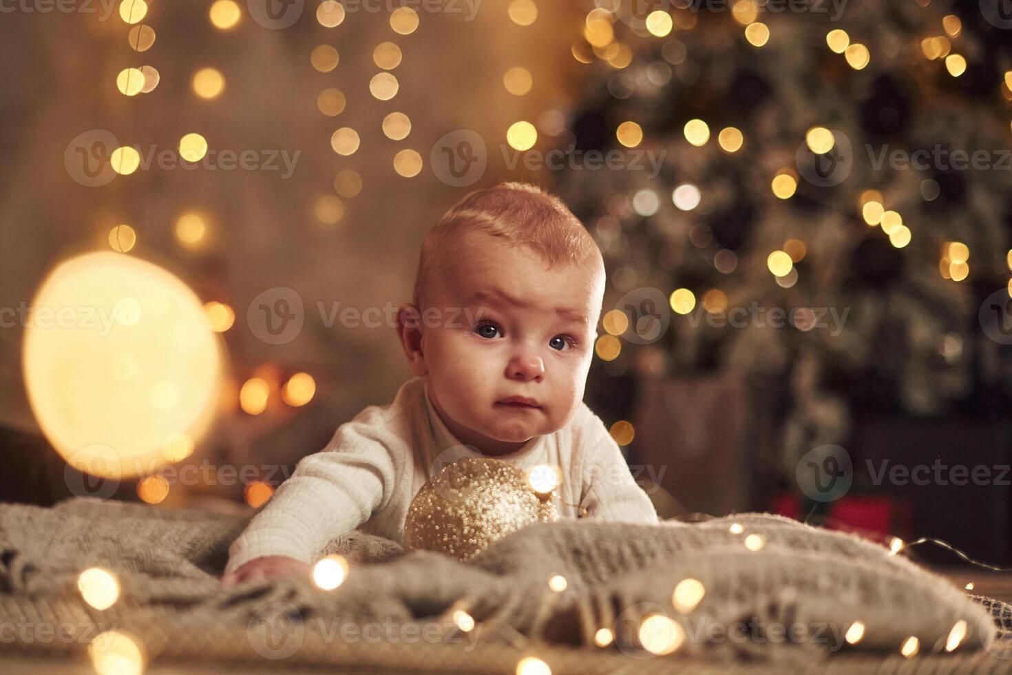New, year ,decorations. Cute little baby is at home. Conception of holidays photo