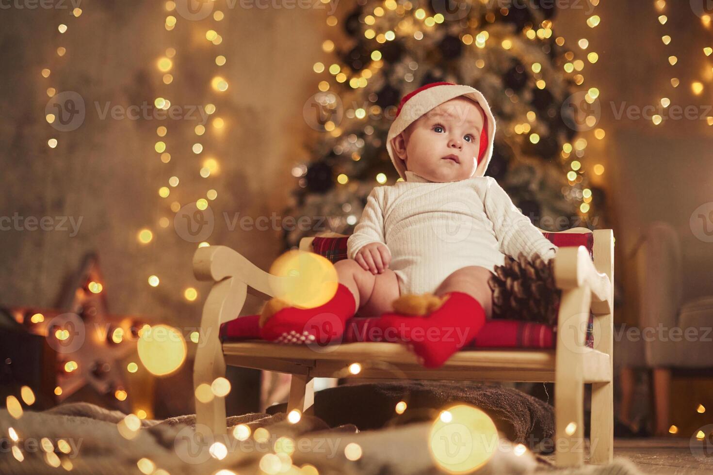 Cute little, baby, is at home. New year decorations. Conception of holidays photo