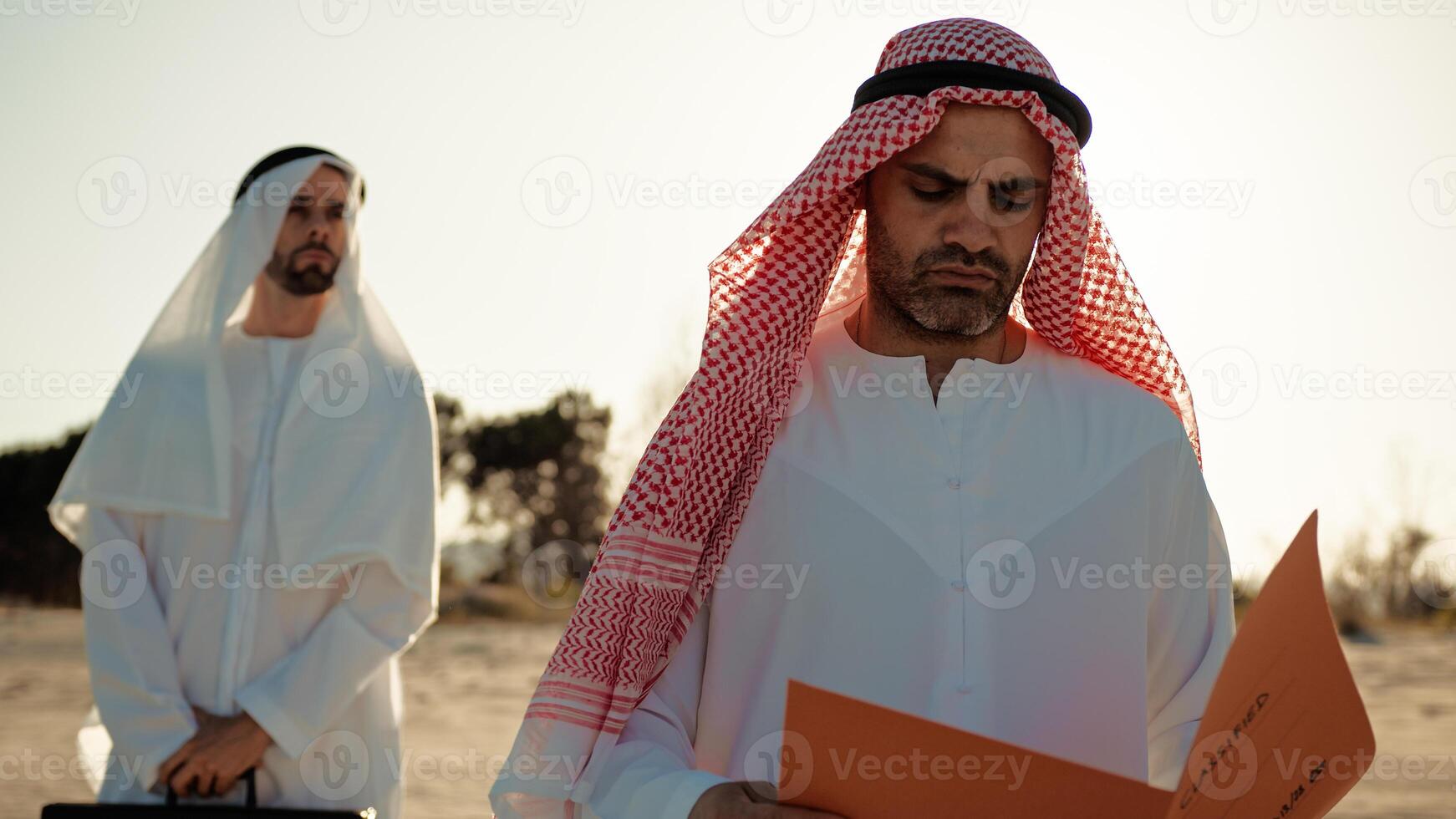 Sheik Opening The Secret Folder To Read photo