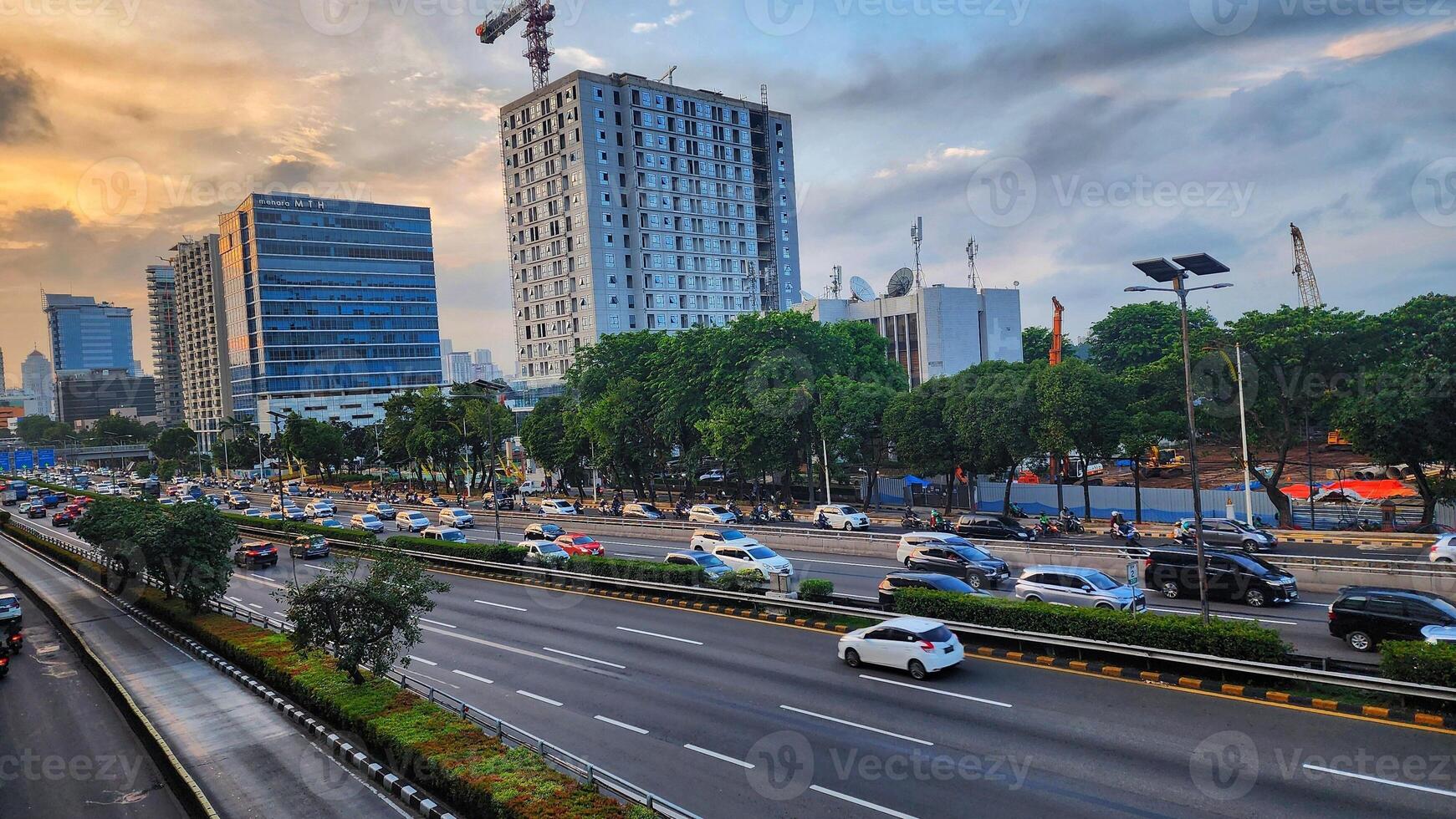 Jakarta Skyline Cityscape at Sunset photo