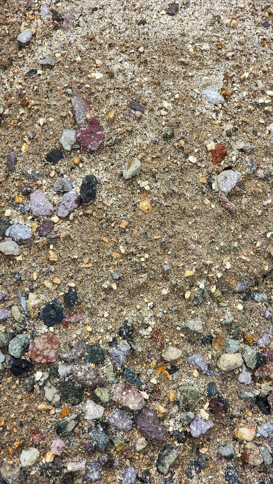 a pile of rocks and gravel on the ground photo
