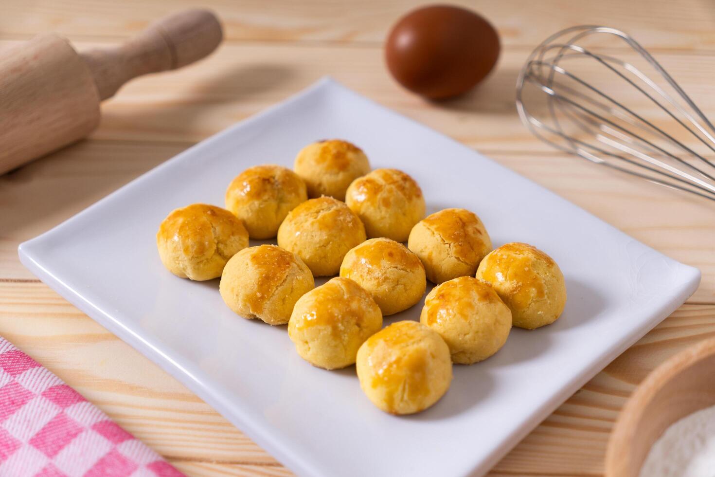 Traditional nastar cookies on a white square plate photo