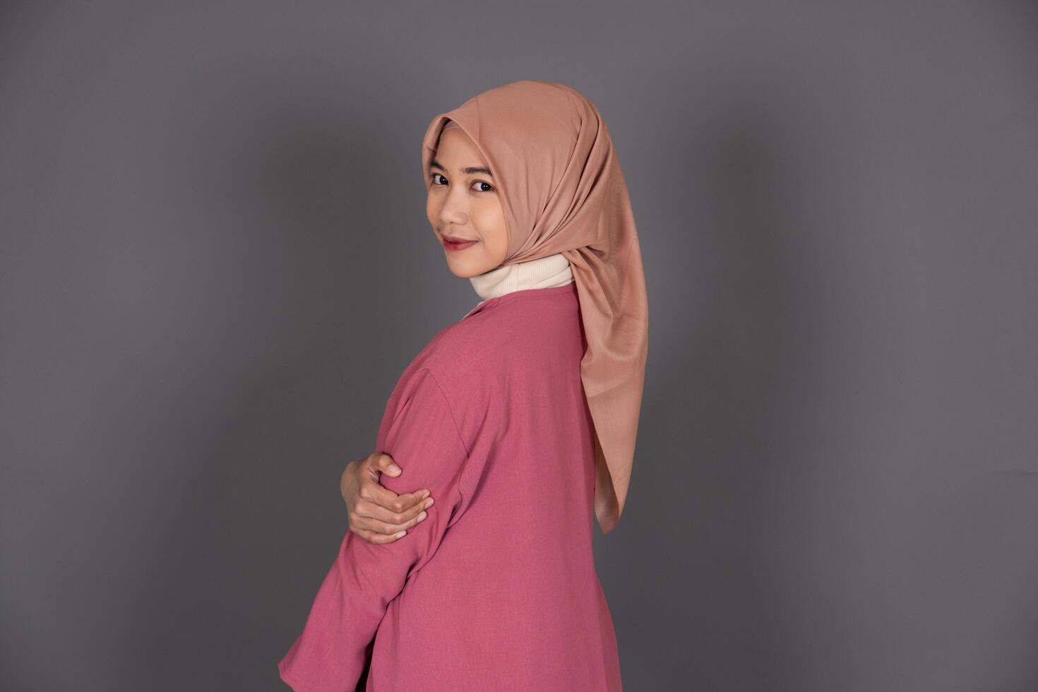 Hijab Female Looking Over Shoulder photo