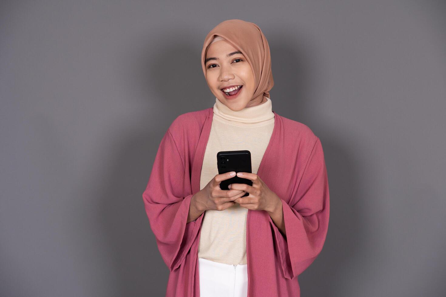 Hijab Woman with Phone photo