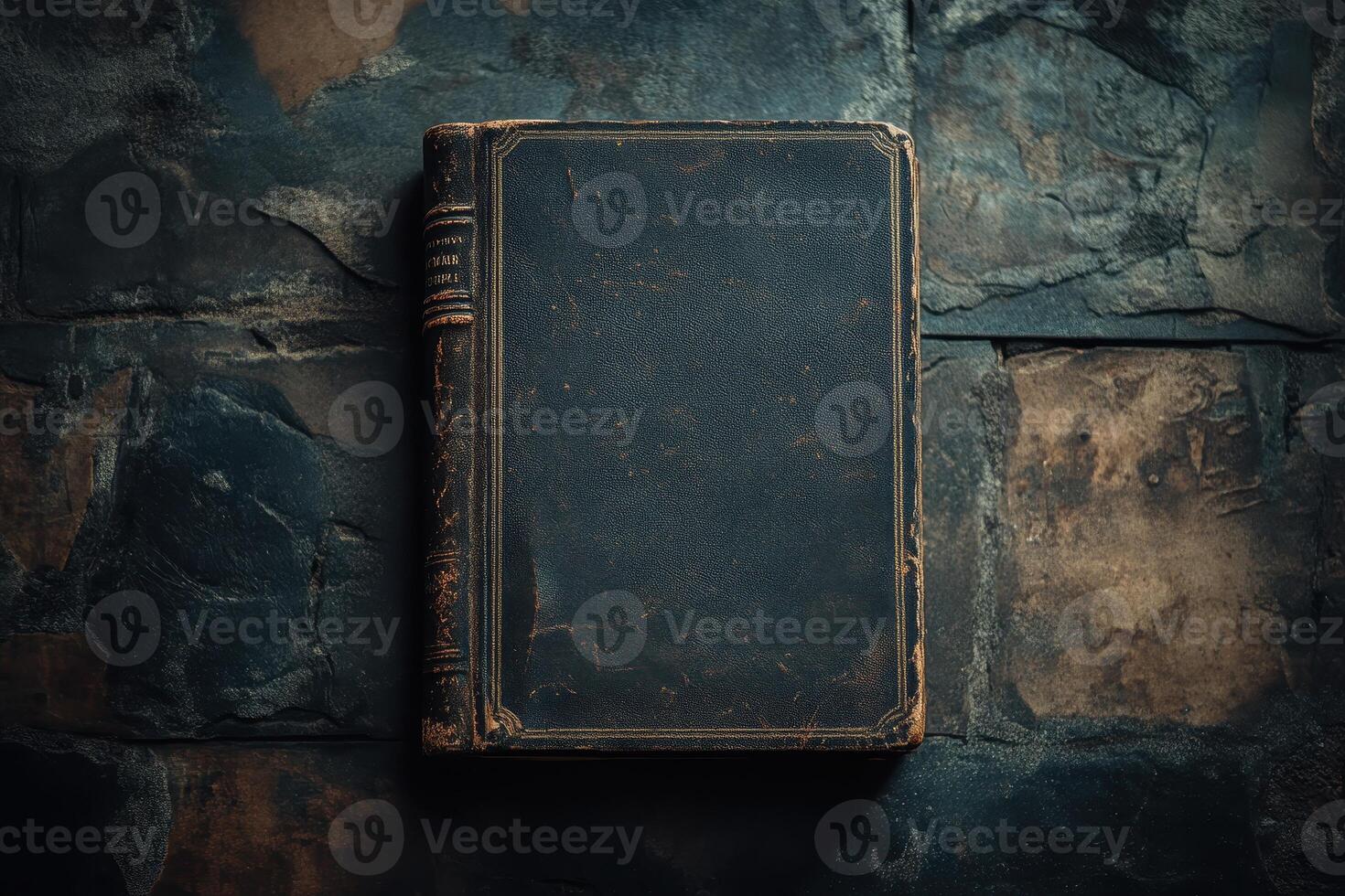 Worn Leather Bound Book on a Slate Background photo
