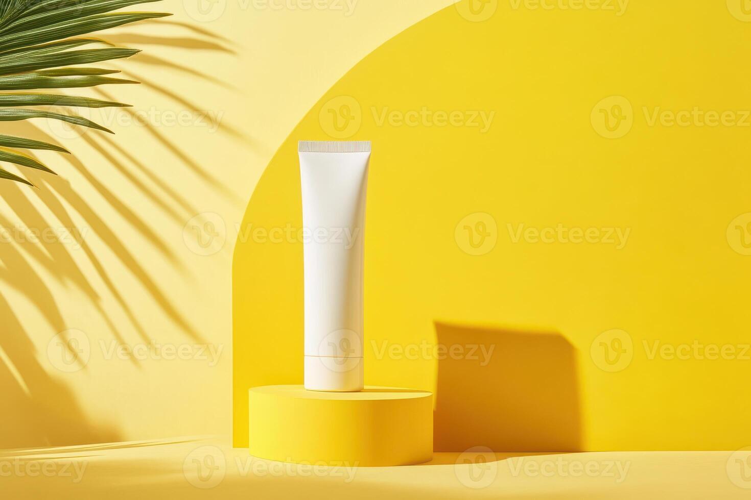 White Tube Cosmetic Product on Yellow Platform with Palm Leaf Shadow photo