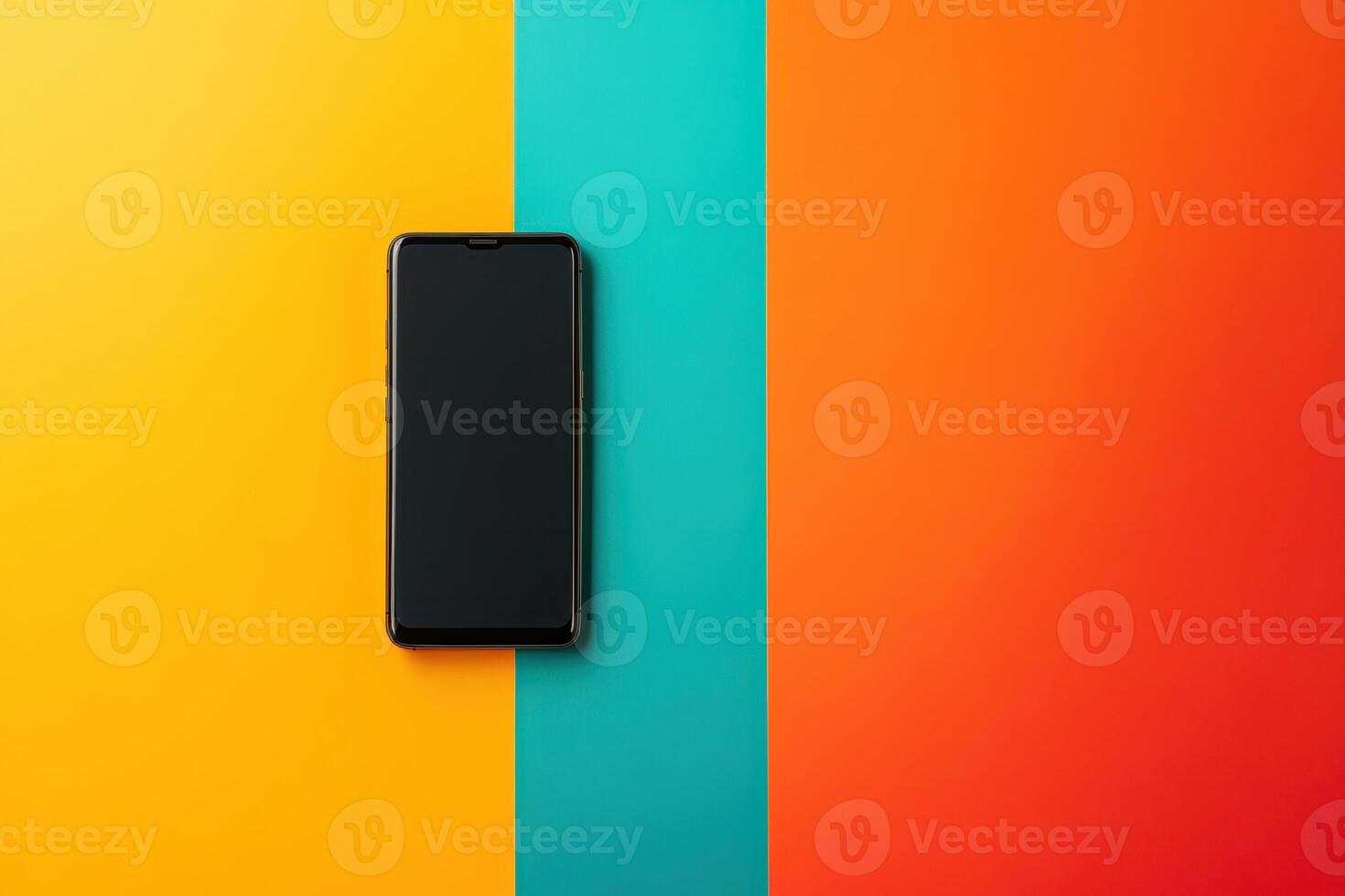 Black Smartphone on Yellow, Teal, and Orange Background photo