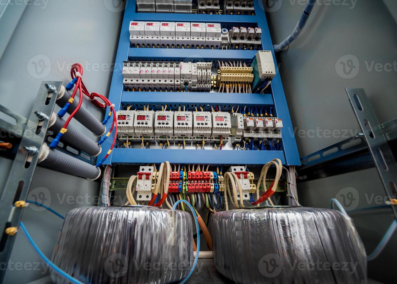 Voltage switchboard with circuit breakers. Electrical background. photo