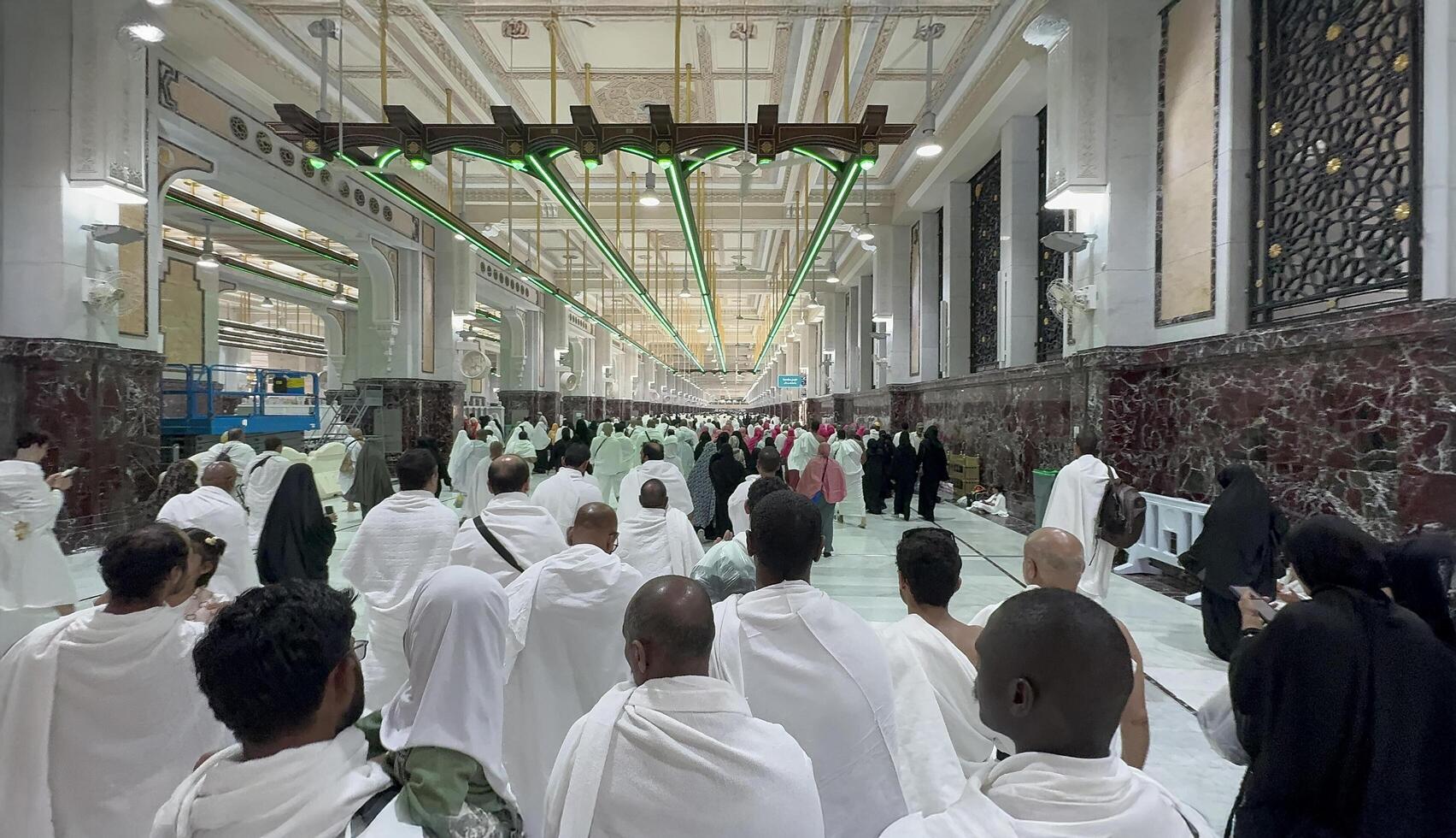 Mecca, Saudi Arabia, May 2 2024. Muslim pilgrims performing Sa'i between Safa and Marwa during Hajj and Umrah in Mecca. A sacred Islamic ritual retracing Hajar's journey, set between two hills near photo