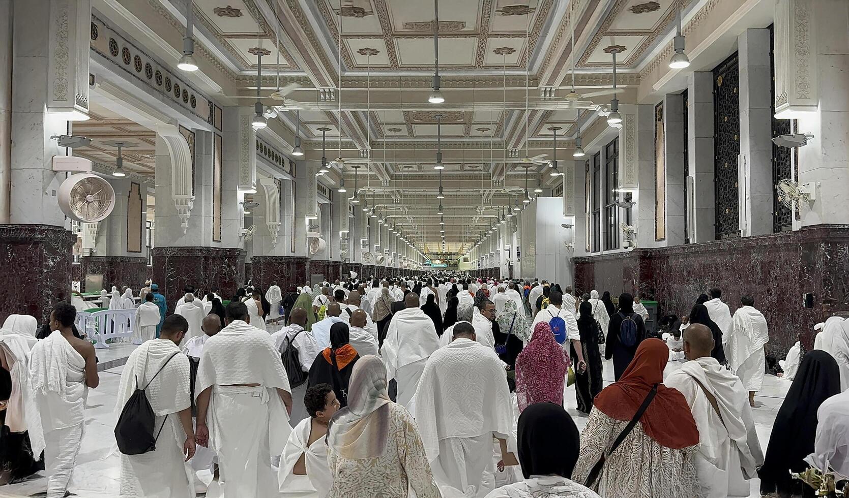Mecca, Saudi Arabia, May 2 2024. Muslim pilgrims performing Sa'i between Safa and Marwa during Hajj and Umrah in Mecca. A sacred Islamic ritual retracing Hajar's journey, set between two hills near photo