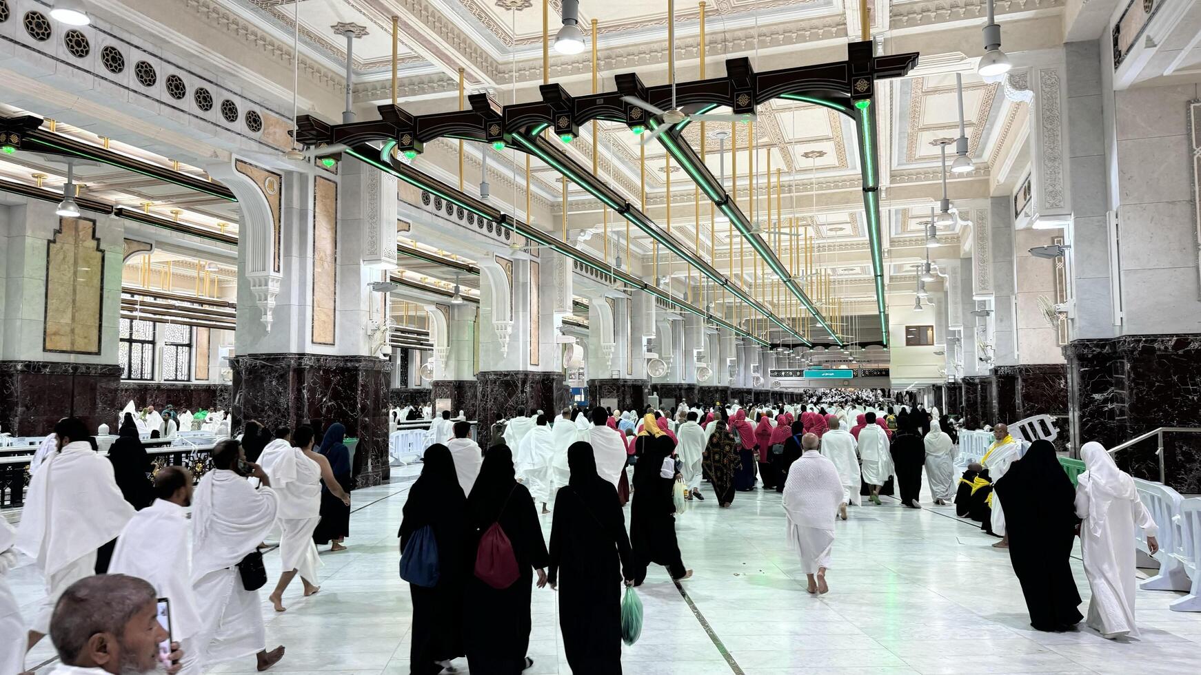 Mecca, Saudi Arabia, May 2 2024. Muslim pilgrims performing Sa'i between Safa and Marwa during Hajj and Umrah in Mecca. A sacred Islamic ritual retracing Hajar's journey, set between two hills near photo