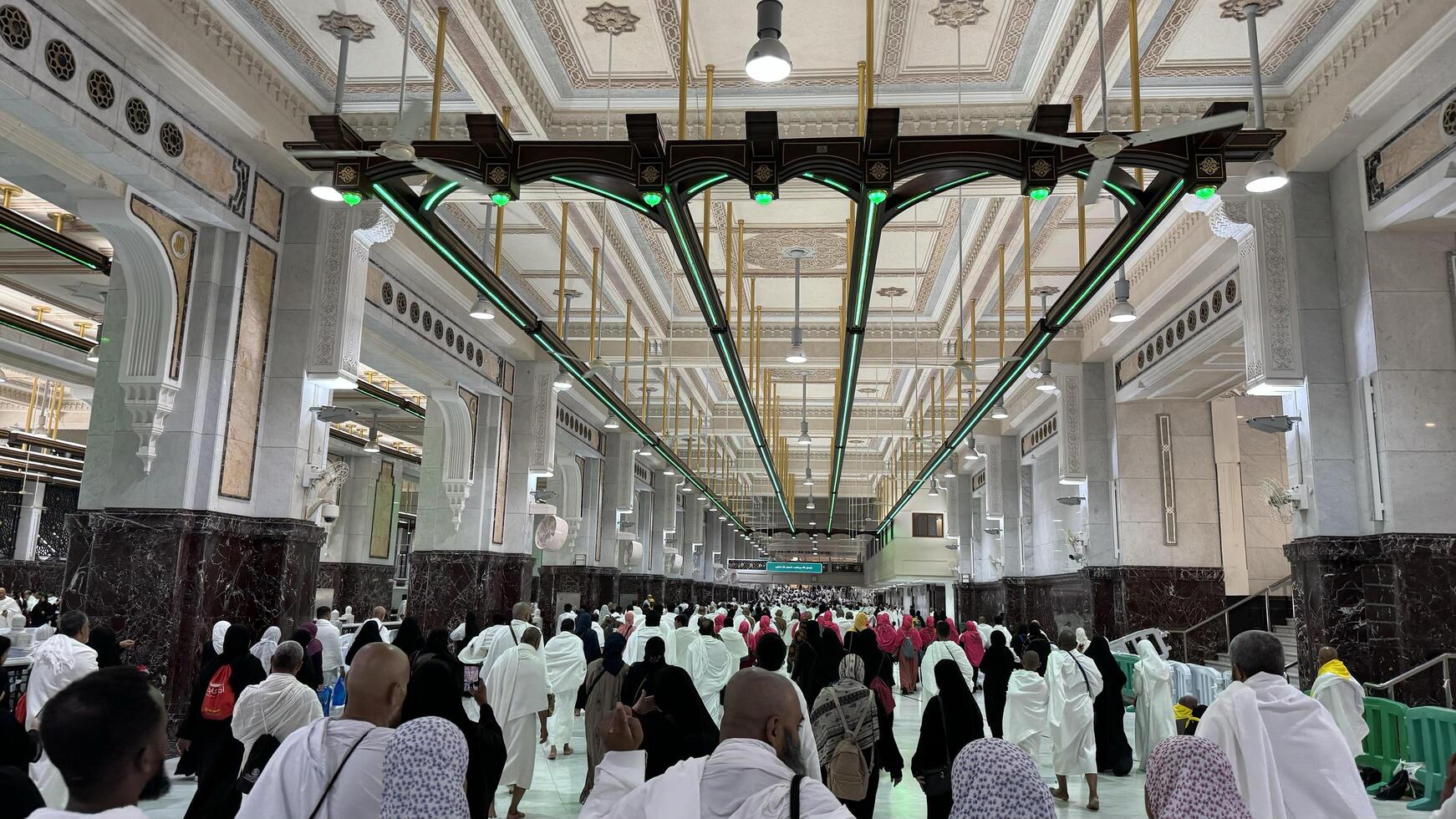 Mecca, Saudi Arabia, May 2 2024. Muslim pilgrims performing Sa'i between Safa and Marwa during Hajj and Umrah in Mecca. A sacred Islamic ritual retracing Hajar's journey, set between two hills near photo