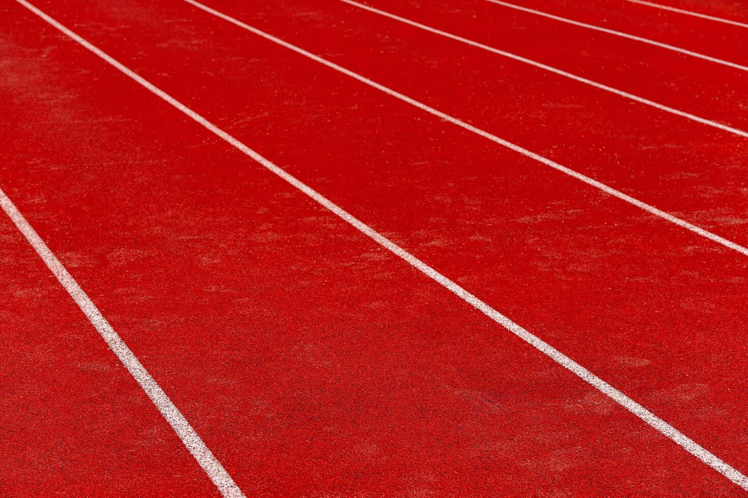 Close up of athlete track or jogging track in university or college campus and building. photo
