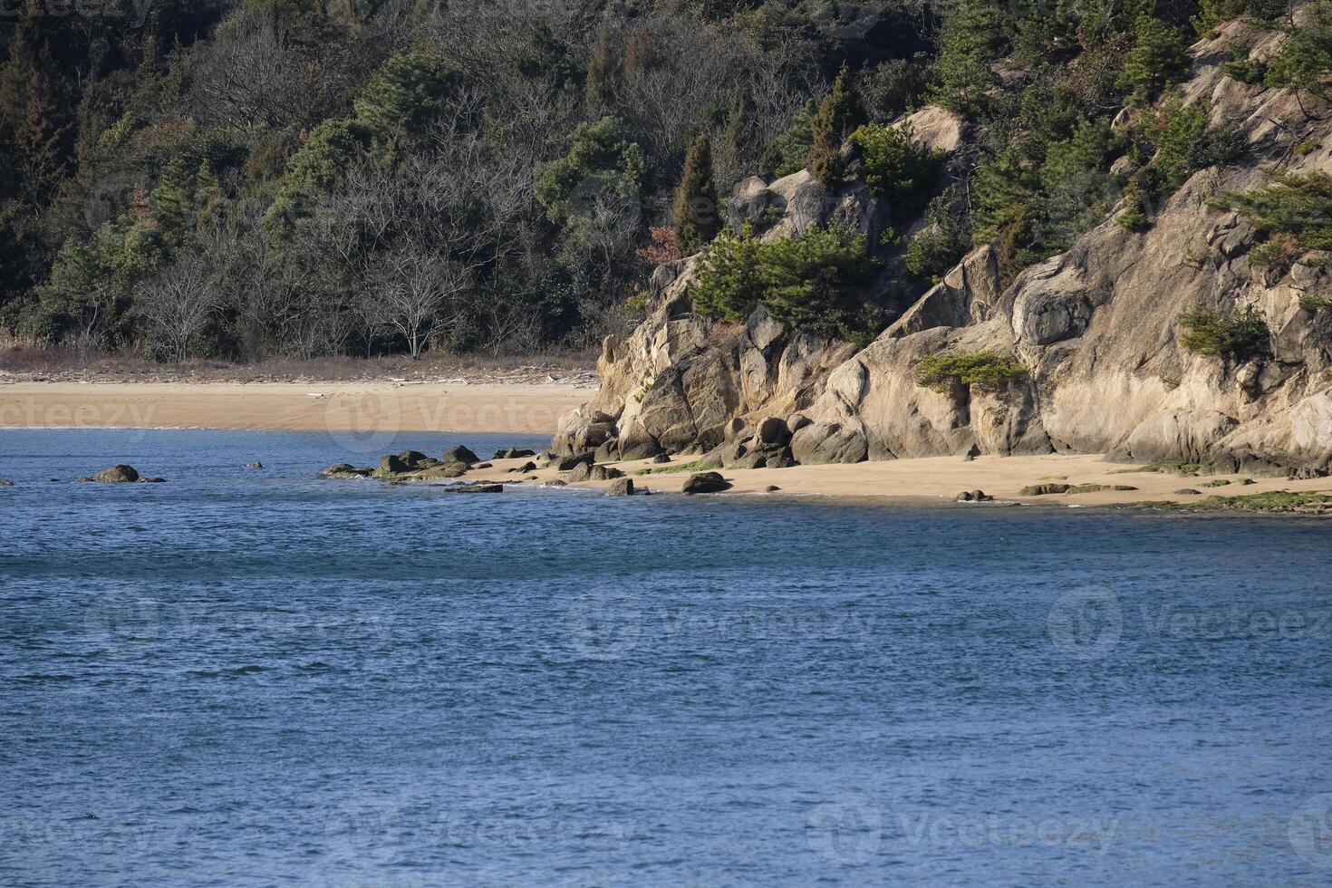 View on the island coastline from a ferry boat to Naoshima, Japan photo
