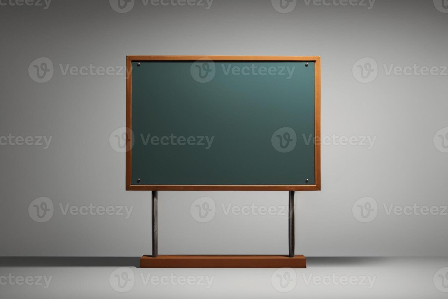 A blackboard with a wooden frame on a gray background photo