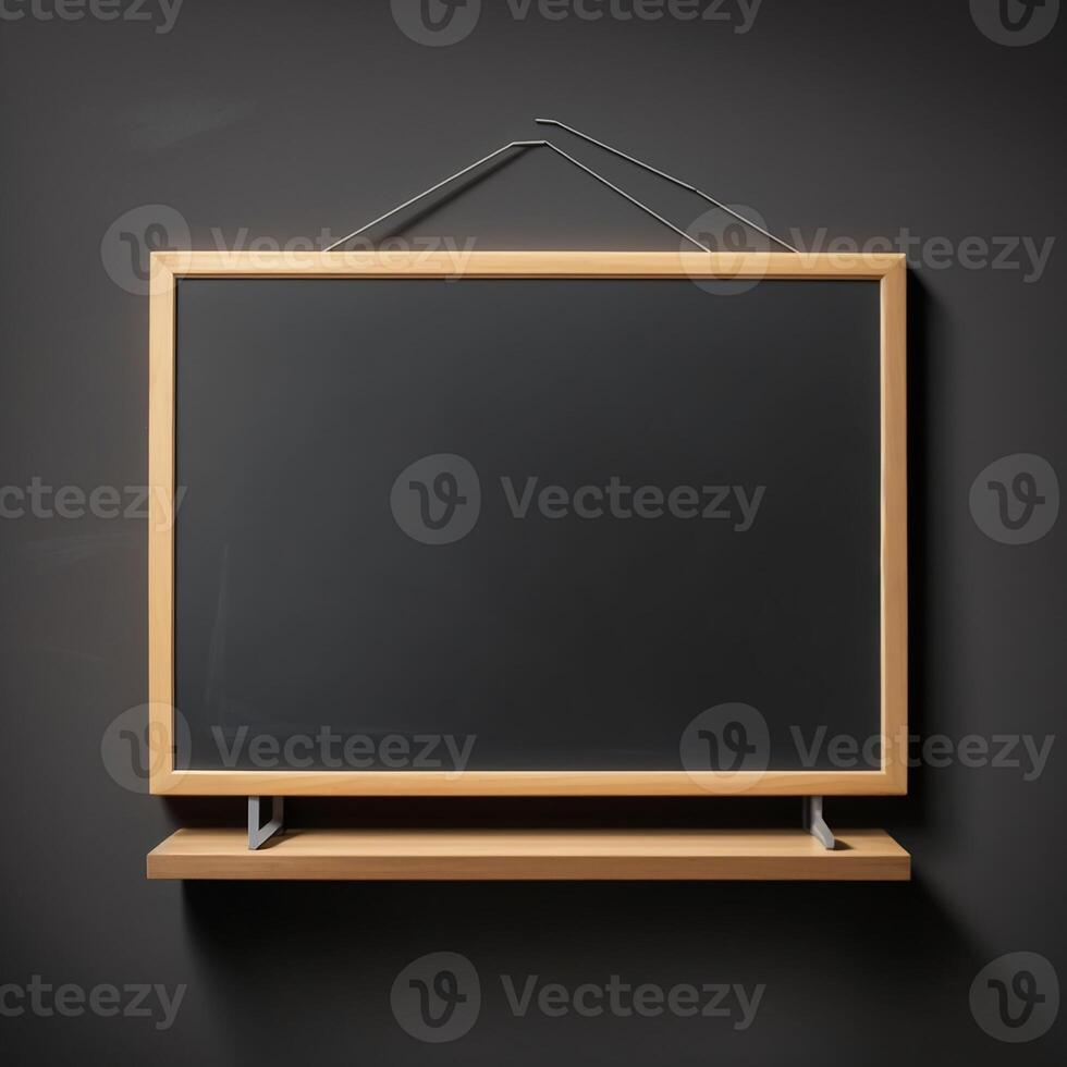 A blackboard with a wooden frame hanging on a wall photo