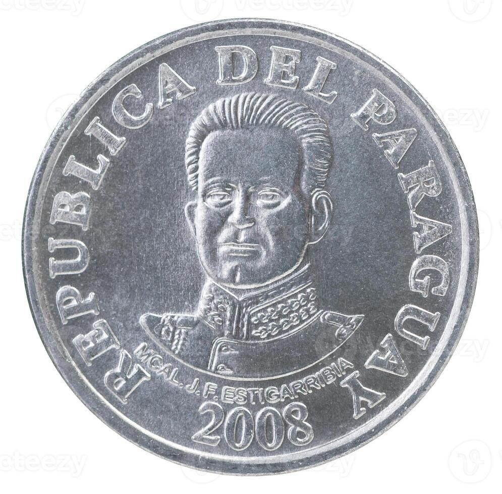 A silver coin with the image of a man on it photo