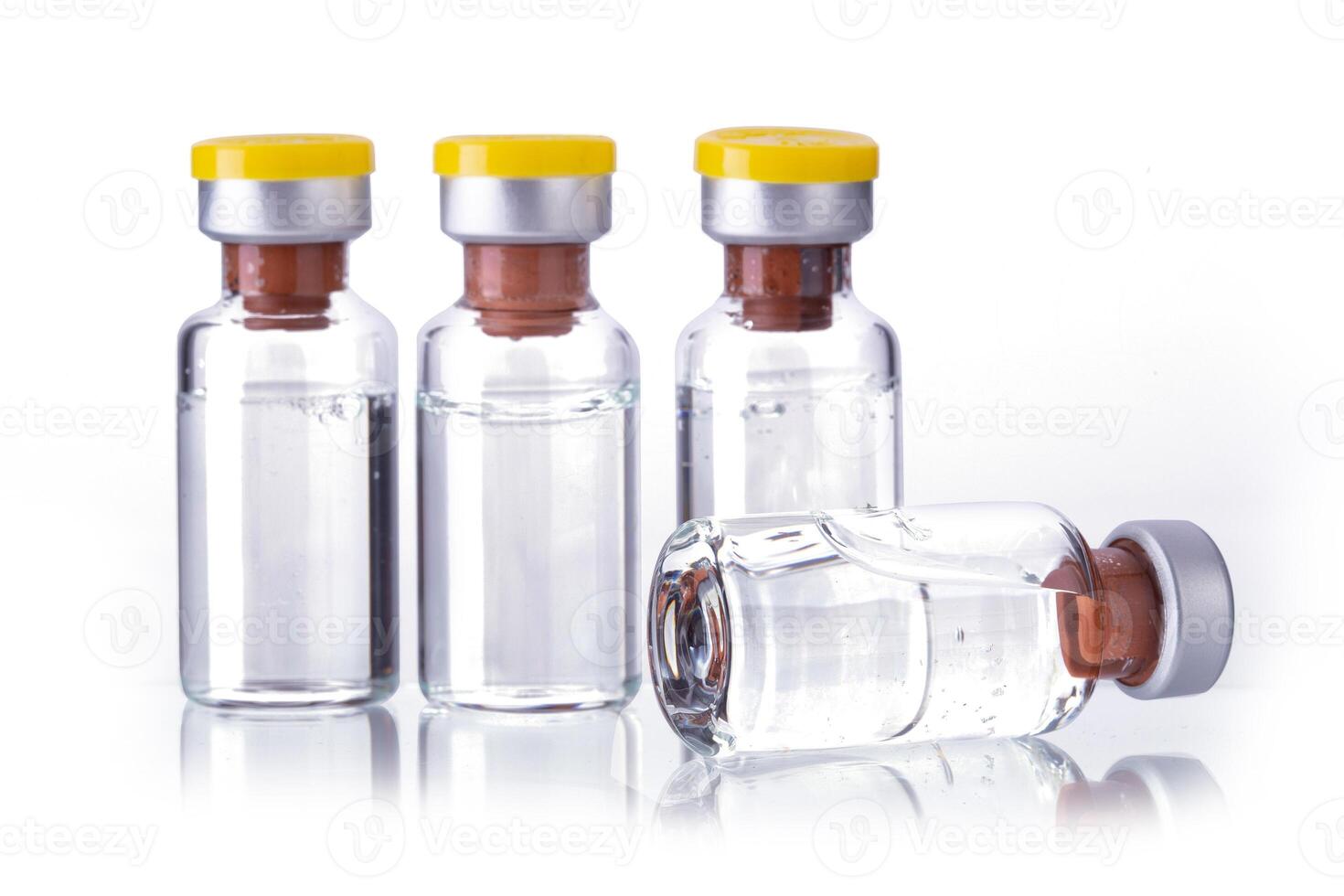 Bottle Vial of Covid-19 Coronavirus Vaccine isolated on a white background photo