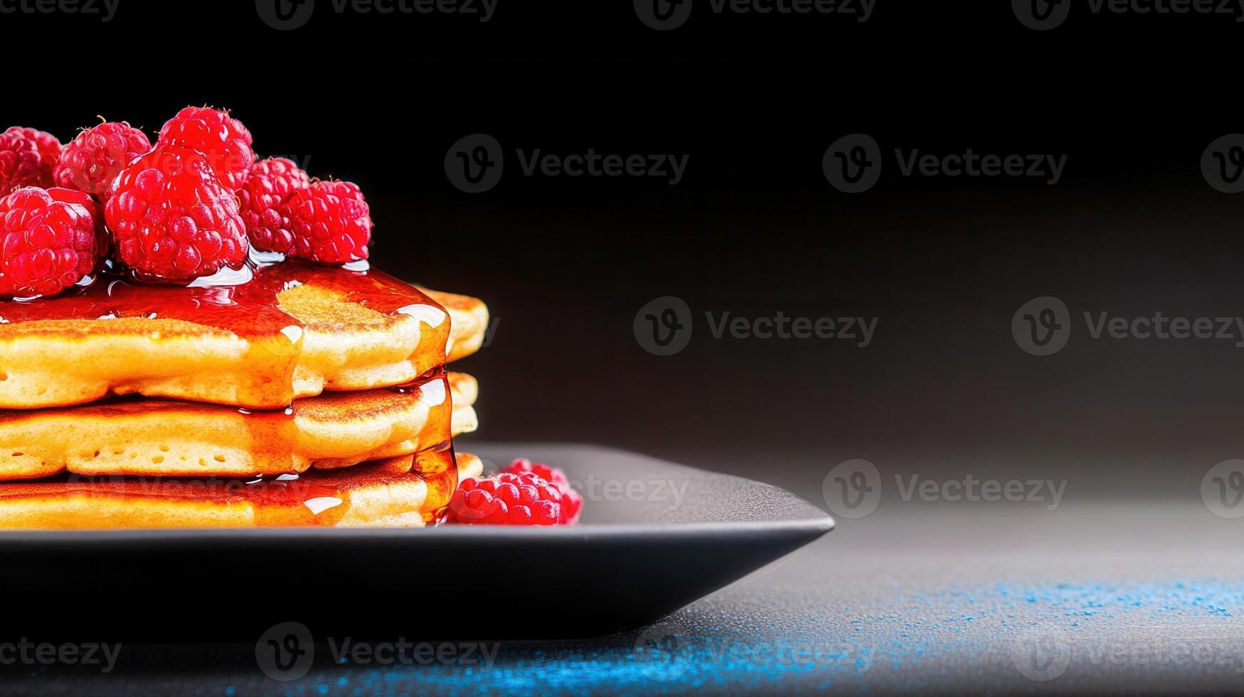 Towering stack of pancakes generously covered with rich raspberry syrup for a delightful morning meal experience photo