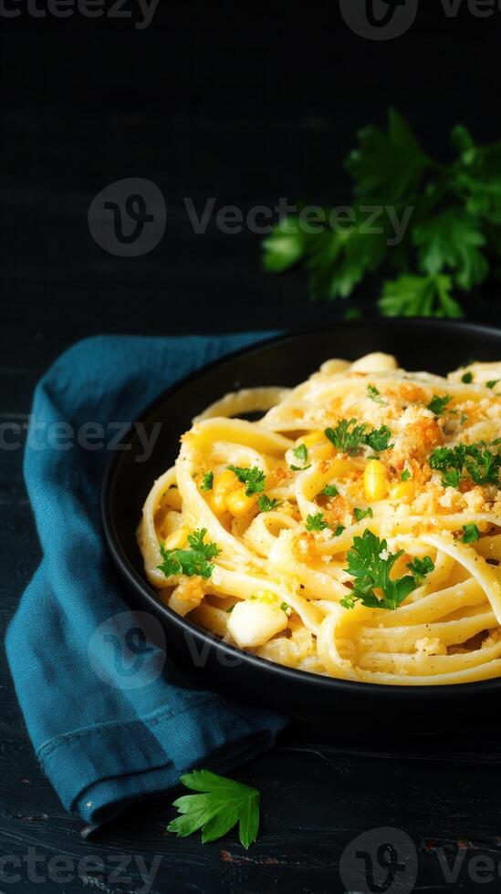 Delicious plate of pasta garnished with fresh parsley served on a rustic wooden table with natural light photo