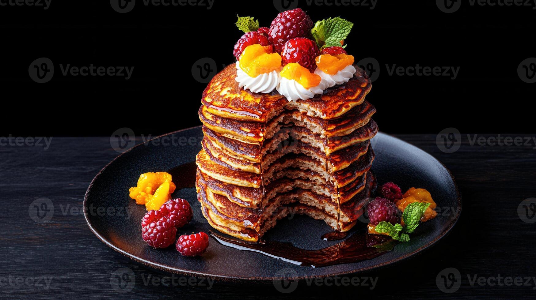 Mouthwatering stack of pancakes adorned with fresh fruit creating a colorful and delicious breakfast display photo