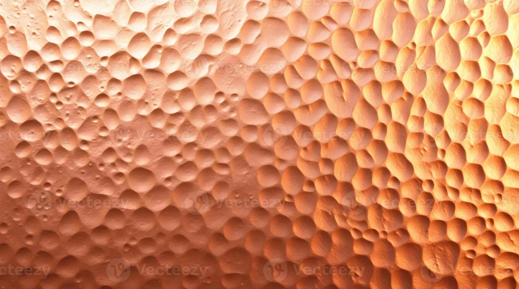 A copper surface with a texture of holes photo