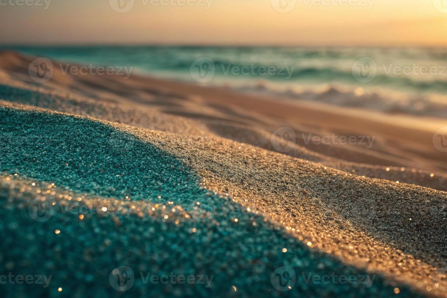 Textured golden beach sand in soft rolling dunes, sparkling under the warm glow of the setting sun, perfect for a calming background photo